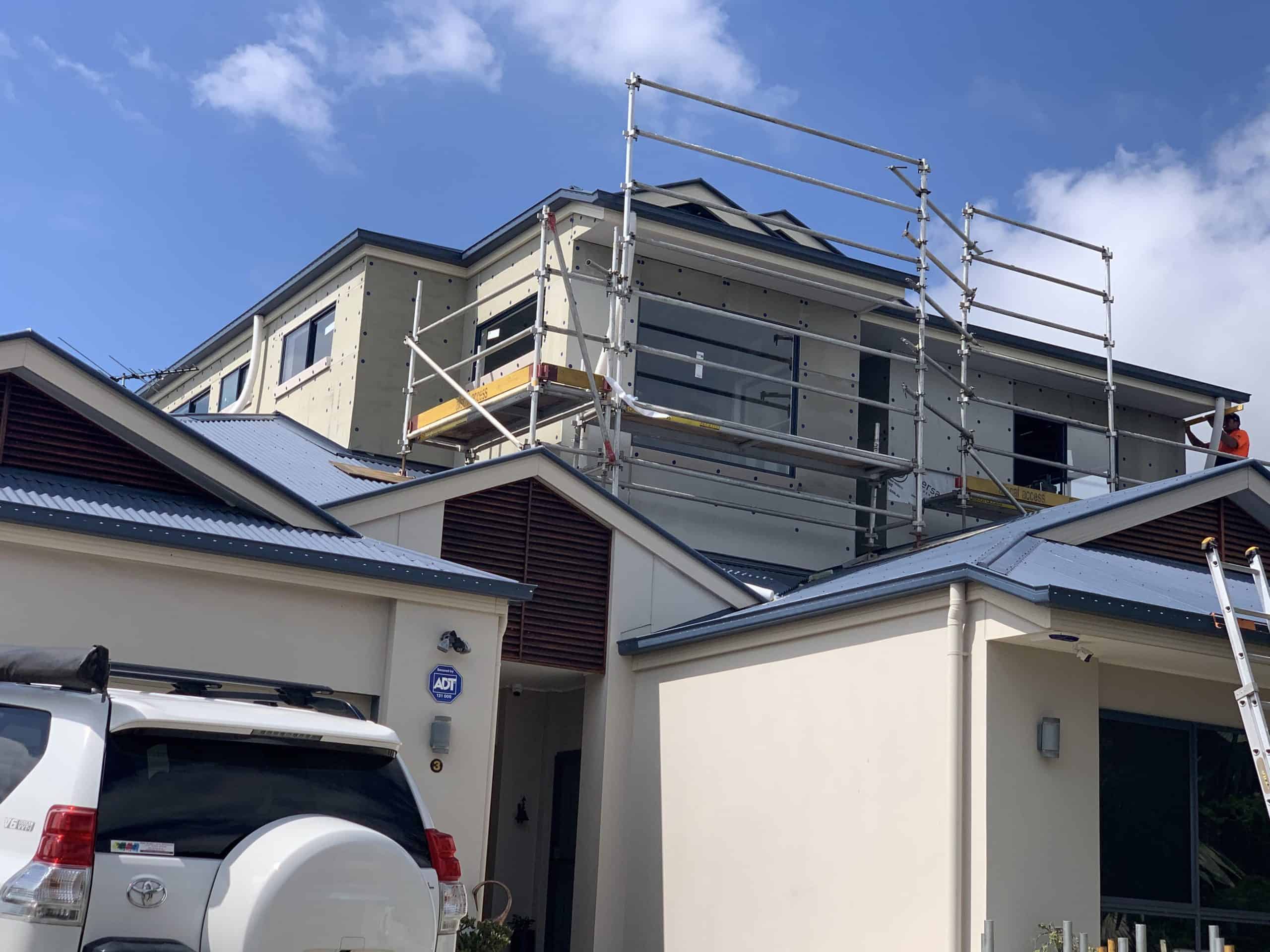 Looking up at the top of a home extension in progress.